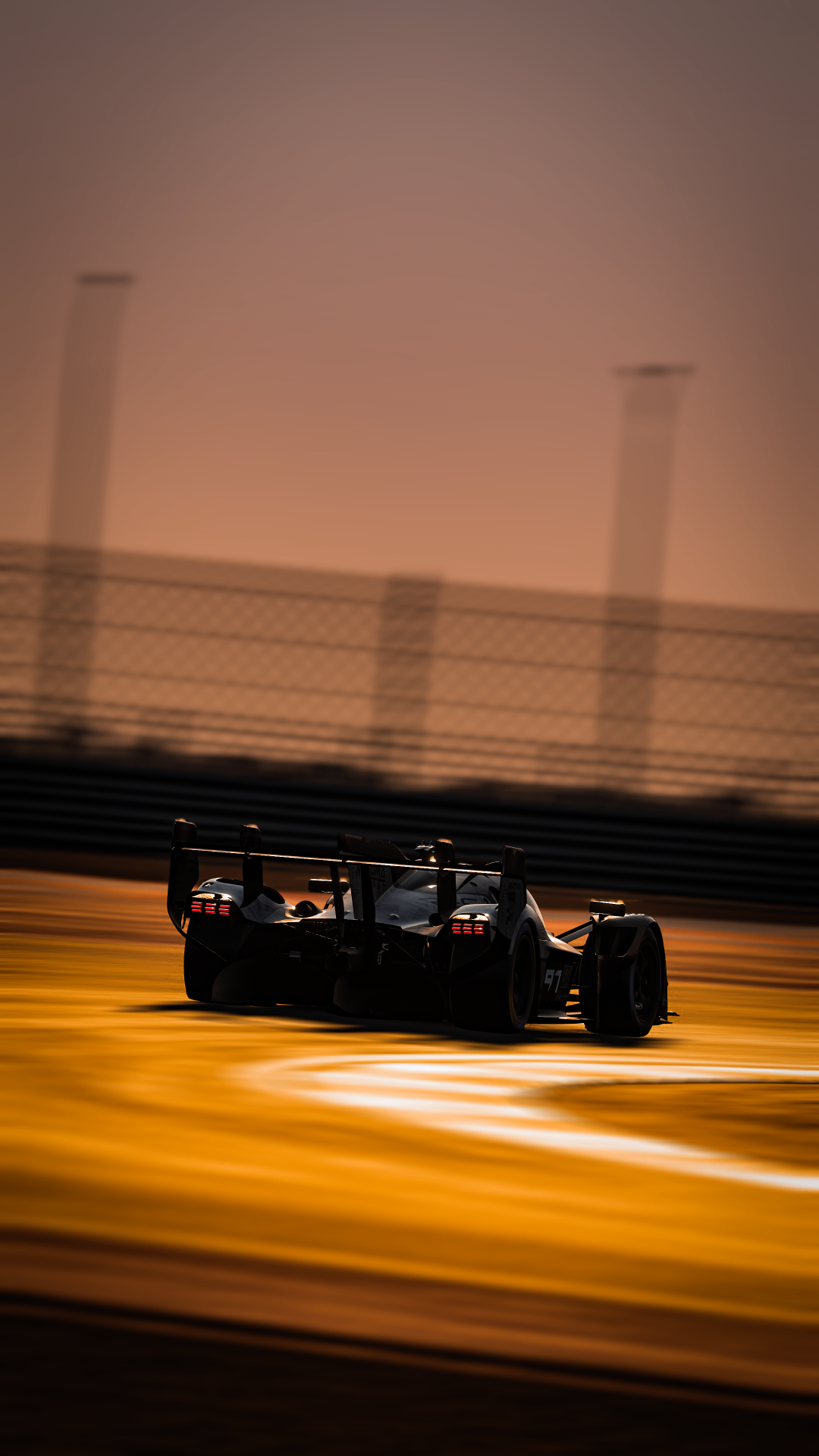 Hypercar silhouette at sunset