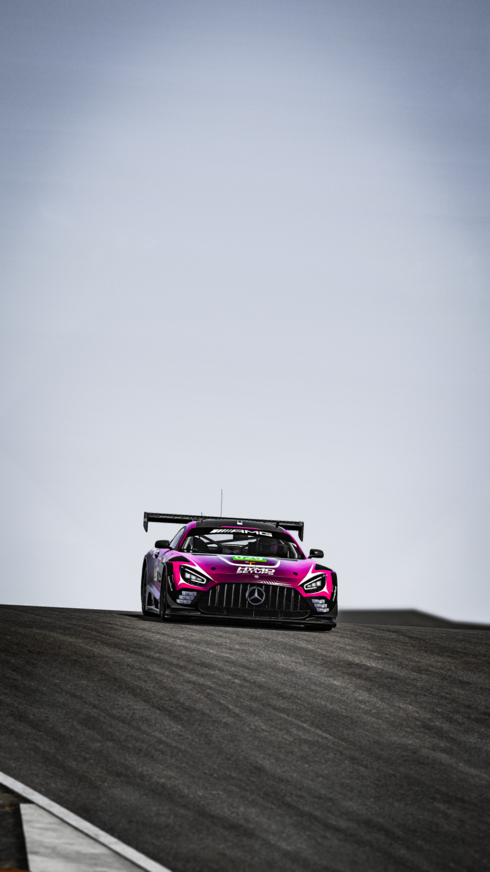 HYMO Mercedes-AMG GT3 cresting the hill